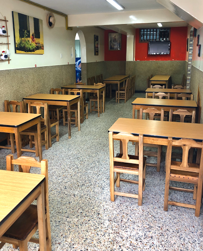 Don Chucho, gallina a la brasa.