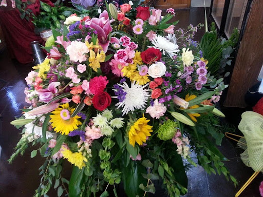 Colors of Life Flowers and Gifts/Eva's Designs