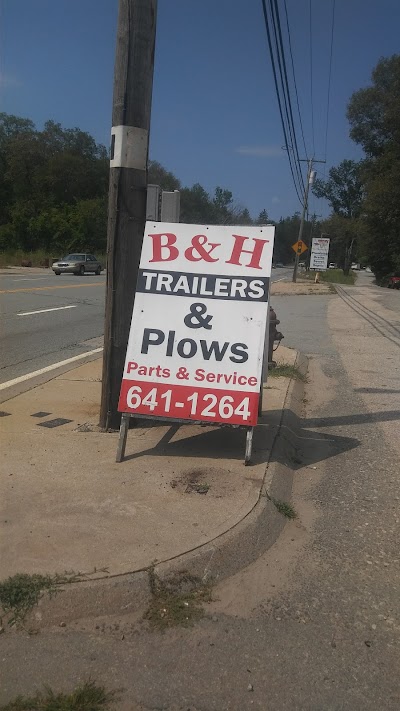B. H. Trailers and Plows