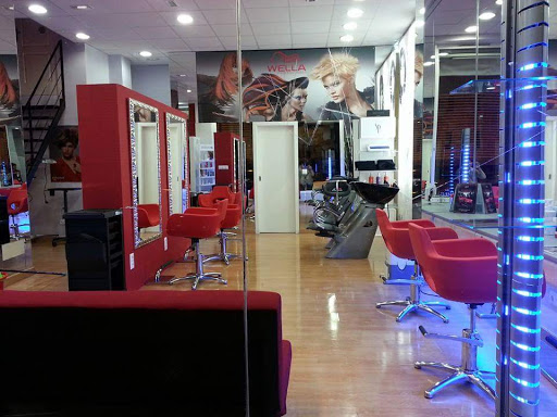 Peluquería Y Estética Ilusion 13 Logo