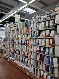 Photo n°27 de Magasin Atmosphère - Rideaux et stores sur-mesure Culinaire Linge de maison Art de la table aux Sables d'Olonne à Les Sables-d'Olonne (Magasin de linge de maison)