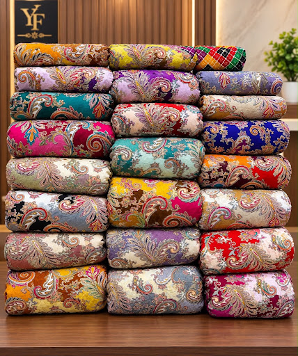 Style the fabric as an elegant flowing saree/dupatta and display an additional neatly folded fabr…