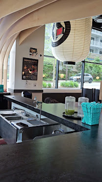 Kura Revolving Sushi Bar by null