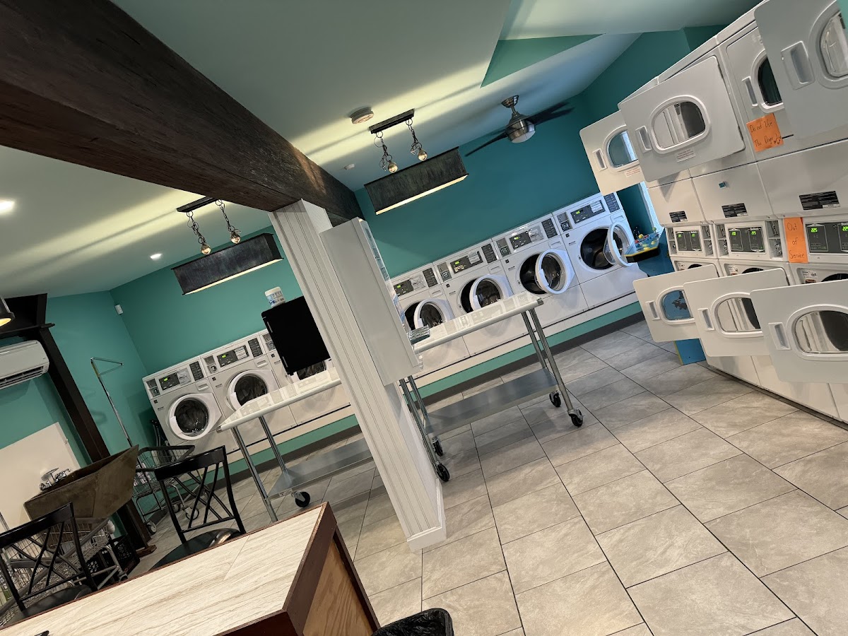 Clean laundry equipment at Platinum Suds 24Hr Classic Coin-Op Laundromat in Biddeford, ME