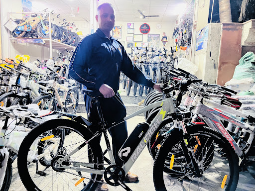 Ride smarter with the powerful Raleigh E Surge Pro Electric Cycle, available at Jagdamba Cycle St…