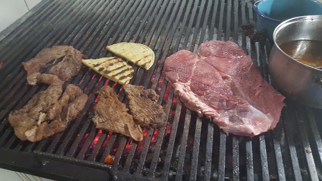 Super tacos al carbon "El Ramiron"