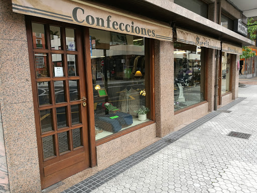 Confecciones y Zapatería Berriki Logo