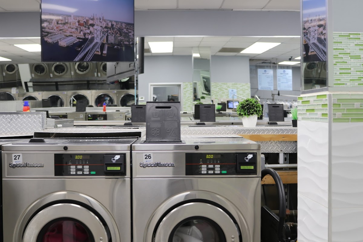 Spins Laundromat Jersey City storefront and entrance in Jersey City