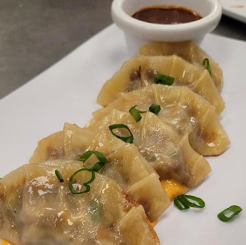 Three22 Kitchen + Cocktails by null