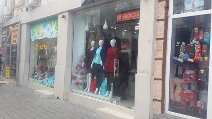 Магазин за Официални и Елегантни Дамски Дрехи Revue | INISESS