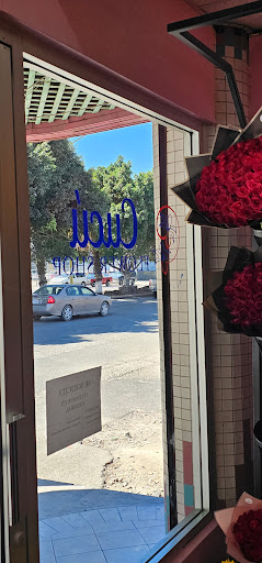 Florería en Tijuana - Cucú Flower Shop Logo