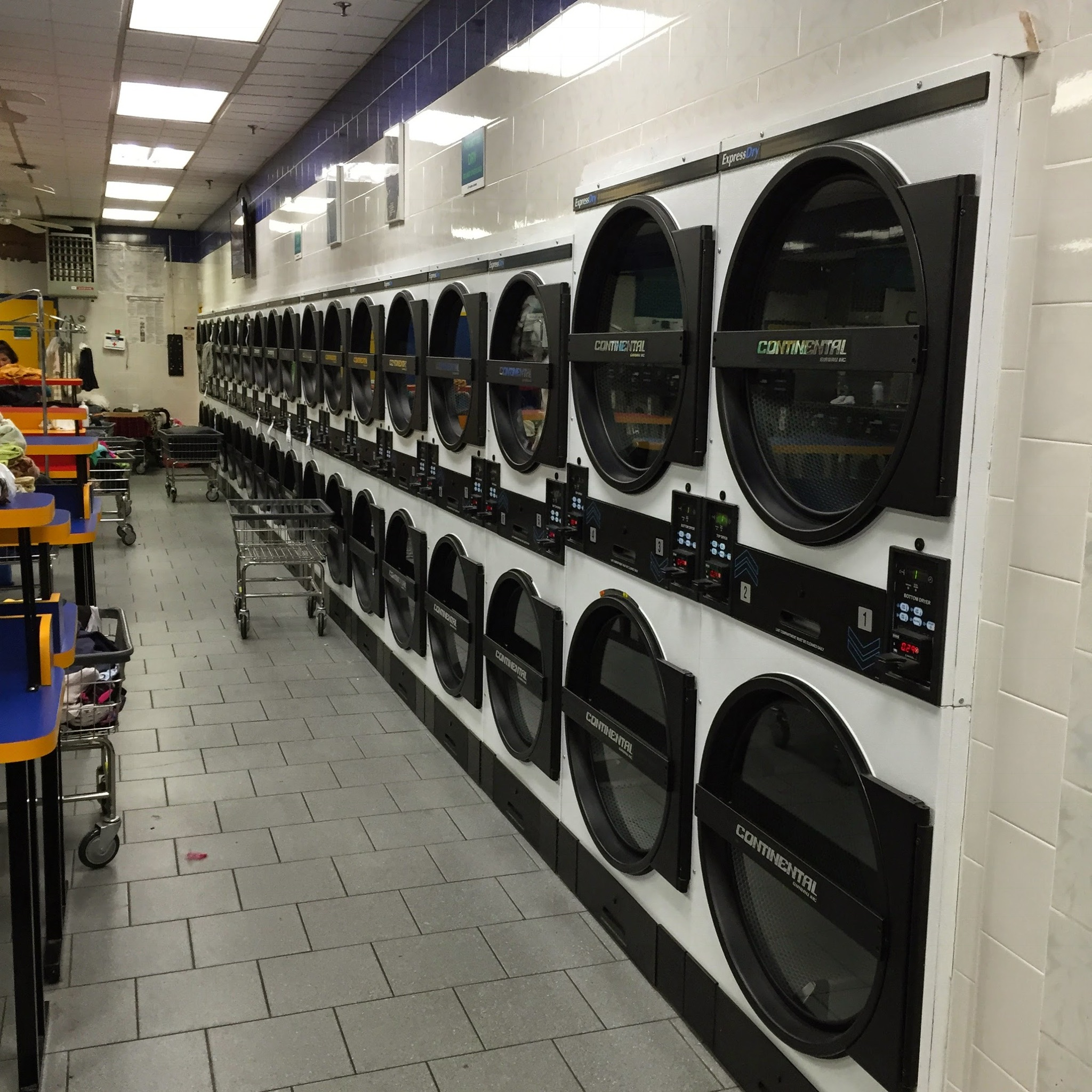 Bubbles N Go Laundromat facility with washing machines in New York