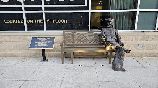 Johnny Appleseed statue on bench - Thumbnail