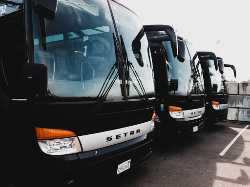Boston Charter Bus and Shuttle Rentals by Bus.com Logo