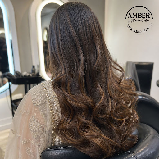 Get festival-ready hair that turns heads with expert blowout and styling at Amber by Bhavikaa Sal… post image