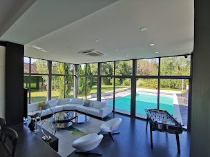 Photo n°4 de Vérandas CONCEPT ALU à Montigny-Lengrain (Atelier de menuiserie)