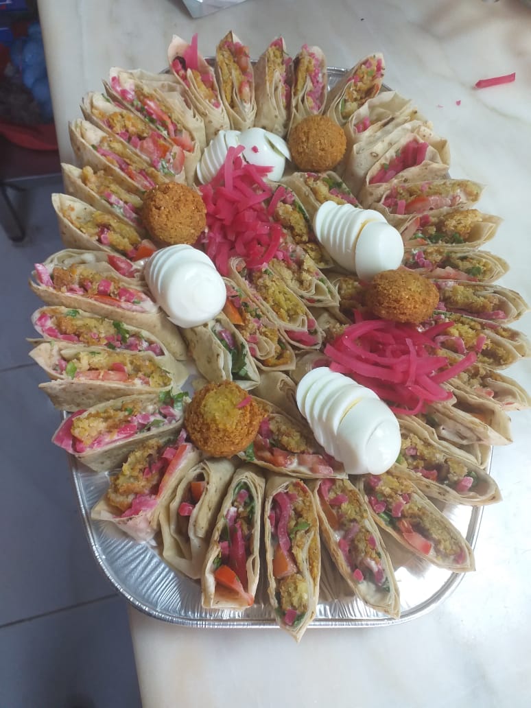 بوفيه غريبه عجيبه فلافل وشاورما - صورة 5