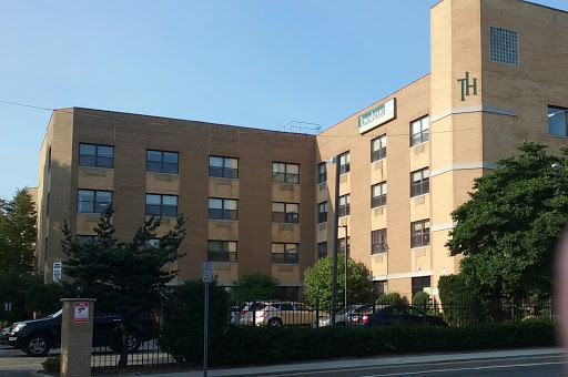 Townhouse Center for Rehabilitation & Nursing Logo