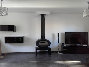 Photo n°2 de GODIN Déco Styl - cheminées - poêles - inserts - La Roche sur Yon - Les Sables d'Olonne à Moutiers-les-Mauxfaits (Magasin de poêles à bois)