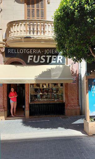 RELOJERIA FUSTER Logo