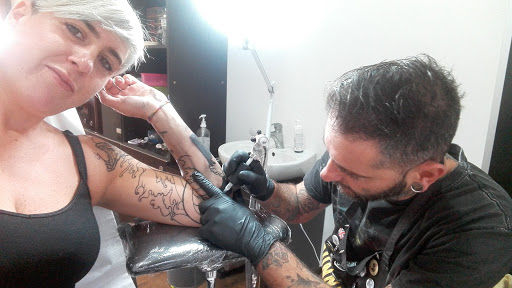 Devil's Mind Tattoo e piercing - Visual