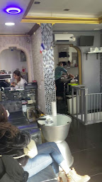 Photo n°17 de Sarl Prestige Coiffure à Tremblay-en-France (Salon de coiffure)