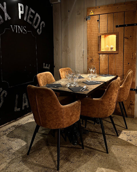 Aux Pieds sous la Table — photo