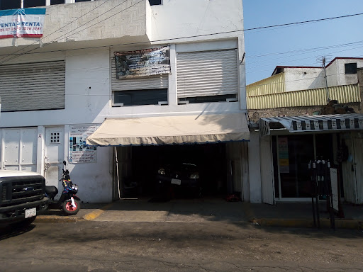 Taller mecánico “servicio flores”