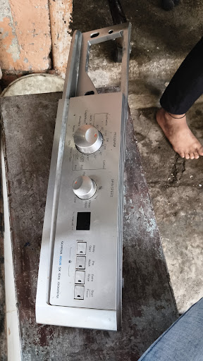 [Cut to: Technician carefully examining the Ifb'washing machine with professional diagnostic tool…