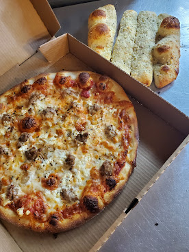 Manolo's Pizza & Empanadas by null