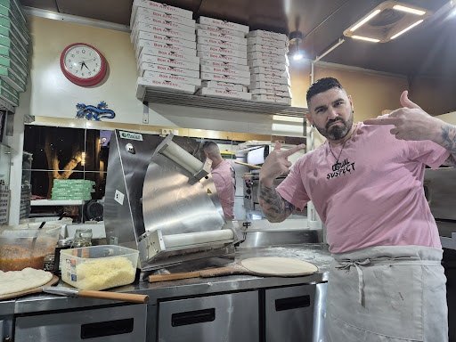 Photo 5 - demon's pizza cuers