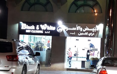 Photos of Black and White Dry Cleaners