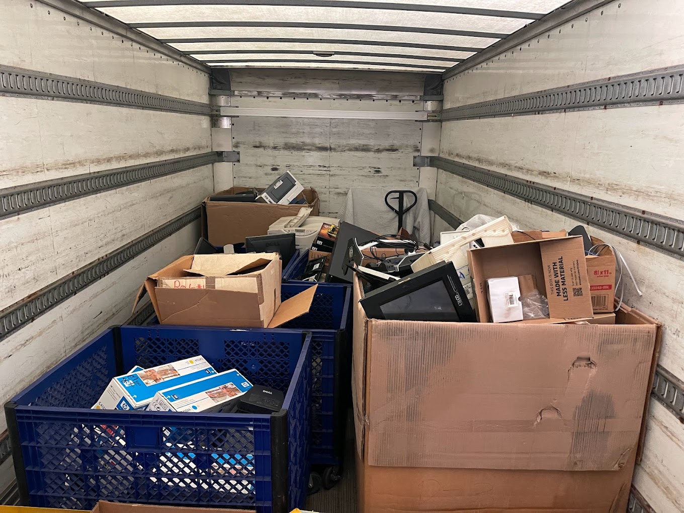 Eco-friendly recycling center in Cumming GA, specializing in the disposal of recyclable electronics, including shredding and secure data destruction services.