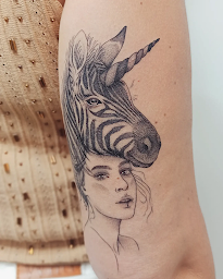 Photo n°4 de Nell tatouage à Sillingy (Tatoueur)