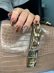 Photo n°6 de Djamila coiffure à Noisiel (Salon de coiffure)