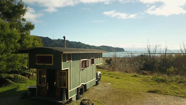 Reviews of Golden Bay Hideaway: Eco-accommodation at the northern end of the Abel Tasman Coast Track. Book direct and save 25%. in Takaka - Parking garage