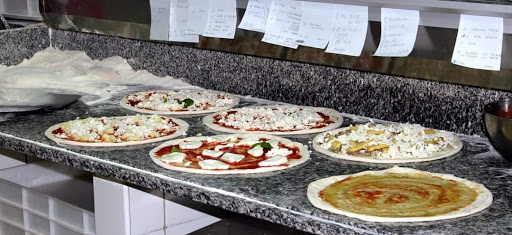 M&M Pizzeria Rosticceria Gallery - Italy
