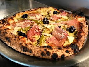 Photo n°1 de La pizza du plateau Chez Peppino à Givors (Pizzeria)