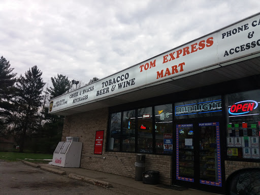 Tom's Express Mart Logo