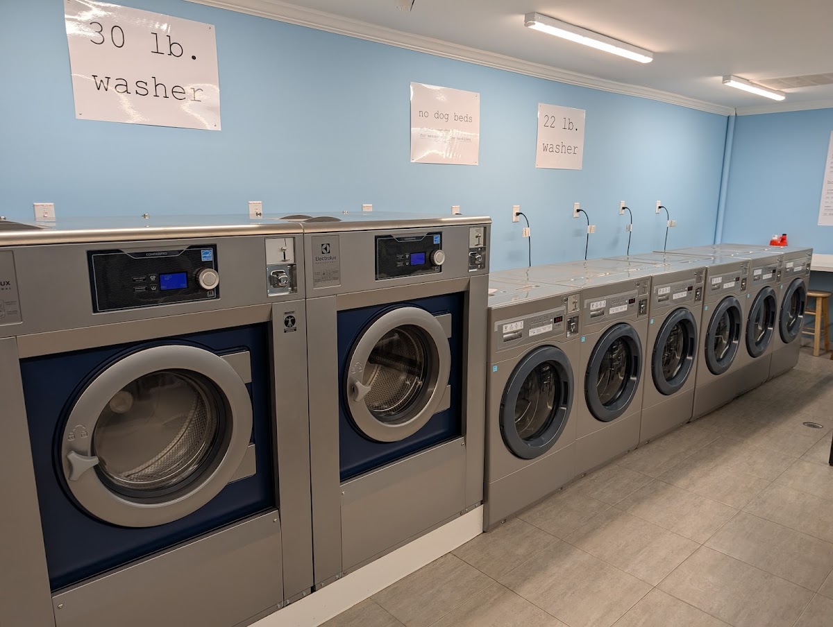 Clean laundry equipment at New Canaan Laundromat in Norwalk, CT