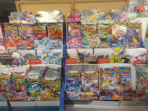 Photo n°8 de Librairie Papeterie FIXOT (Discount35),Cartes Pokémon, Cartes Lorcana, Presse, jeux de société, colis mondial Relay à Montauban-de-Bretagne (Magasin de cartes de collection)