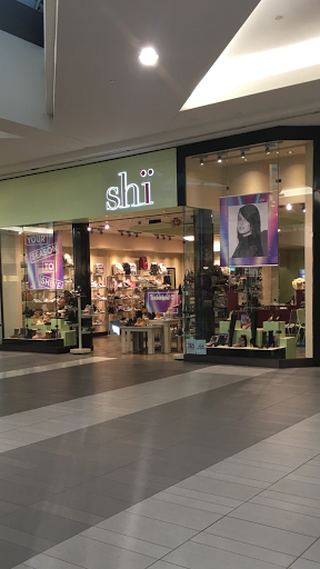 Shi By Journeys Logo