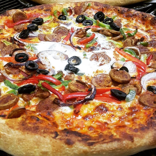 Planète Pizza Stains (Achahada) Gallery - France