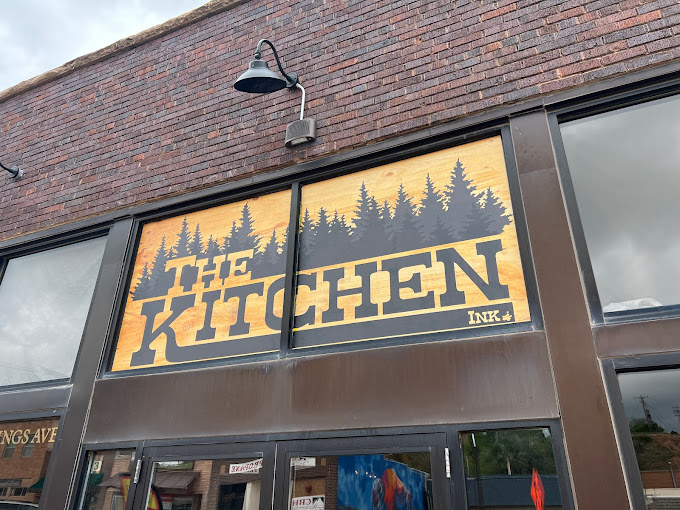 The Kitchen Ink features American fare such as sandwiches, potato salad, sweet potato fries, and more. Try their house-made chips. We love them!