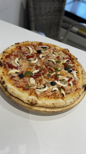 Numéro de téléphone de Pizza du village St Loup