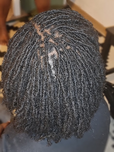 Microlocks and Sisterlocks installation and retie/Dreadlocks retie