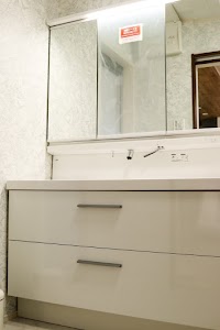 （有）冨安水工店