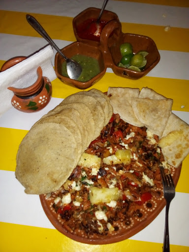 Tacos Árabes La Parrilla Logo