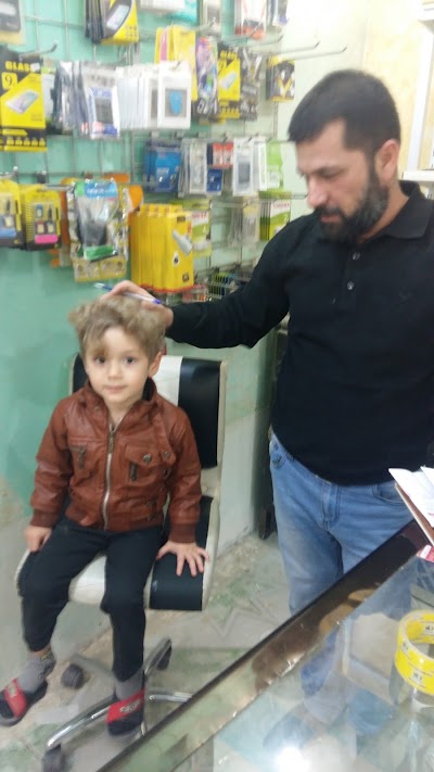 Photos of Barakat imams mobile phone office