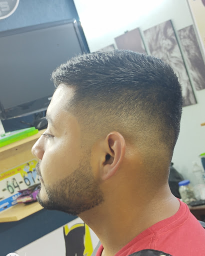 Khalifa cuts barber